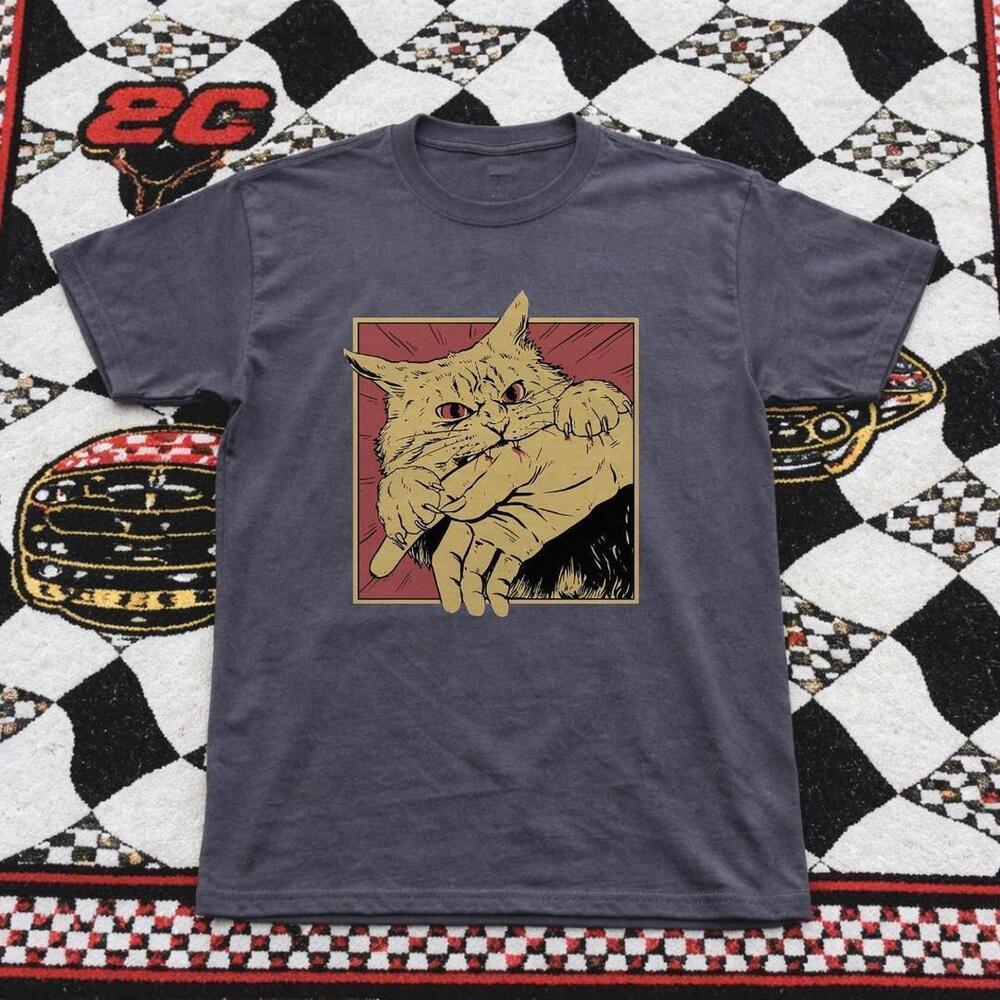 Grey Graphic Tee With A Bold Eye Catching Design Featuring A Cat